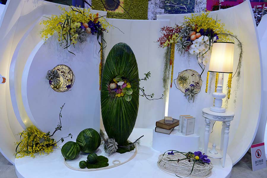世園會(huì)主題館花藝館里琳瑯滿目的插花作品