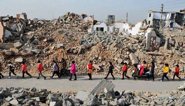 打工子弟學(xué)校被廢墟包圍 還需堅(jiān)持三年