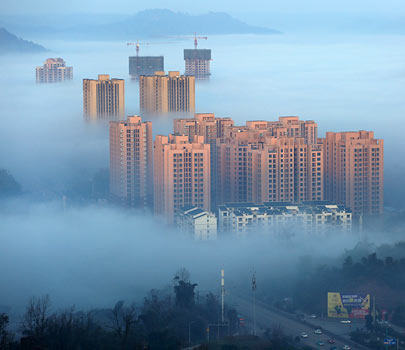 重慶大足現(xiàn)平流霧美景 城市恍若仙境 重慶大足現(xiàn)平流霧美景 城市恍若仙境