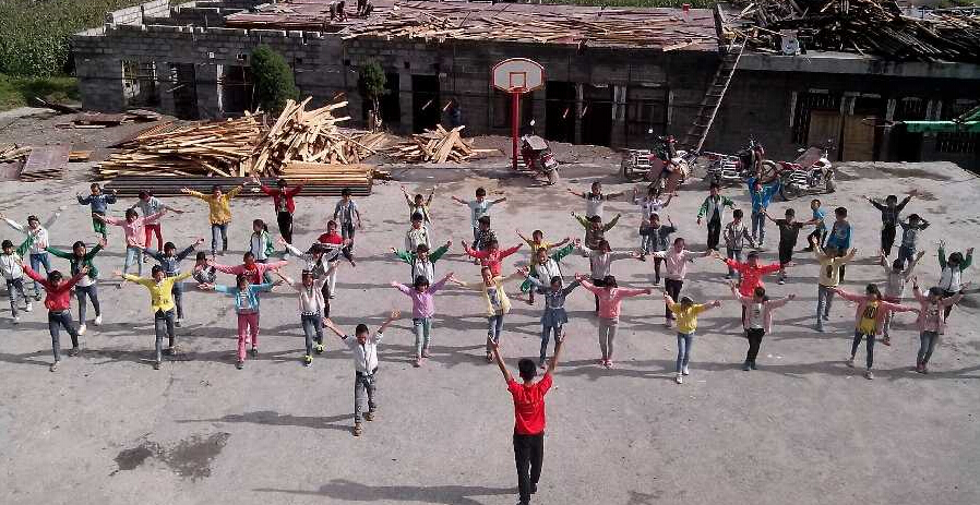 不畏特大洪災(zāi) 青島大學(xué)生暑期再赴云南支教