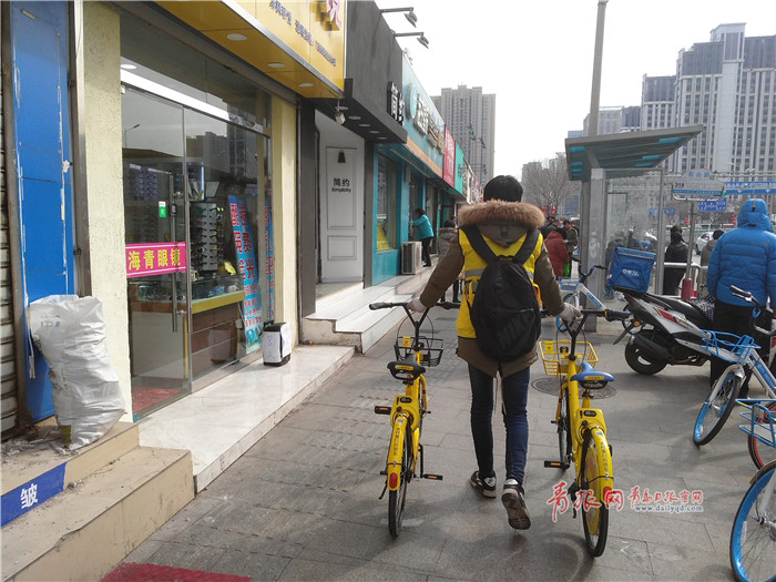 市北试点共享单车定点泊车 首批24个泊位已施