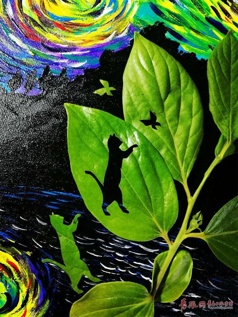 一叶一世界青岛网友绿叶上雕出一个春天