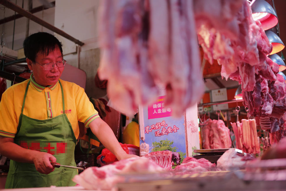 时隔12年北大屠夫再现广州猪肉摊